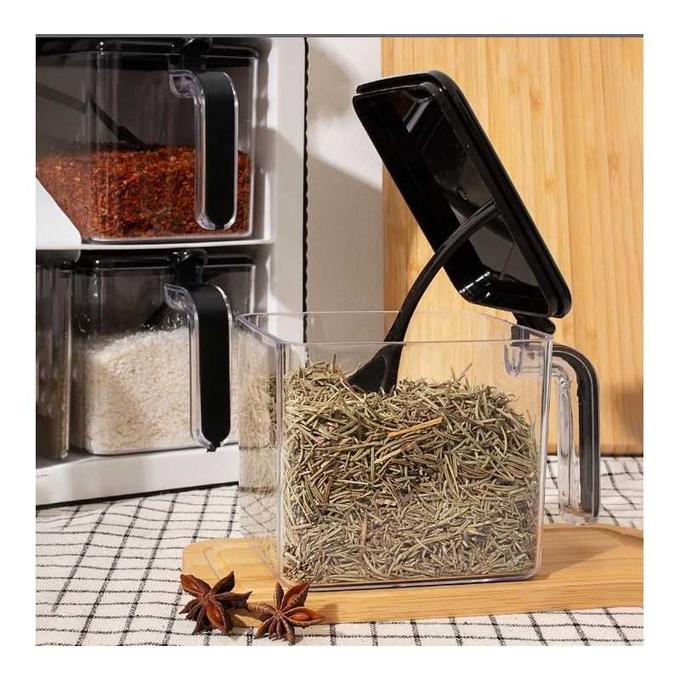 Organisateur d'épices avec cuillère autonivelante.