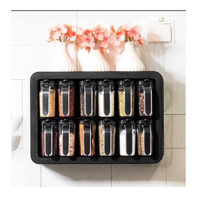 Organisateur d'épices avec cuillère autonivelante.