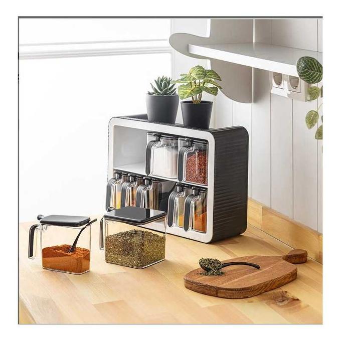 Organisateur d'épices avec cuillère autonivelante.